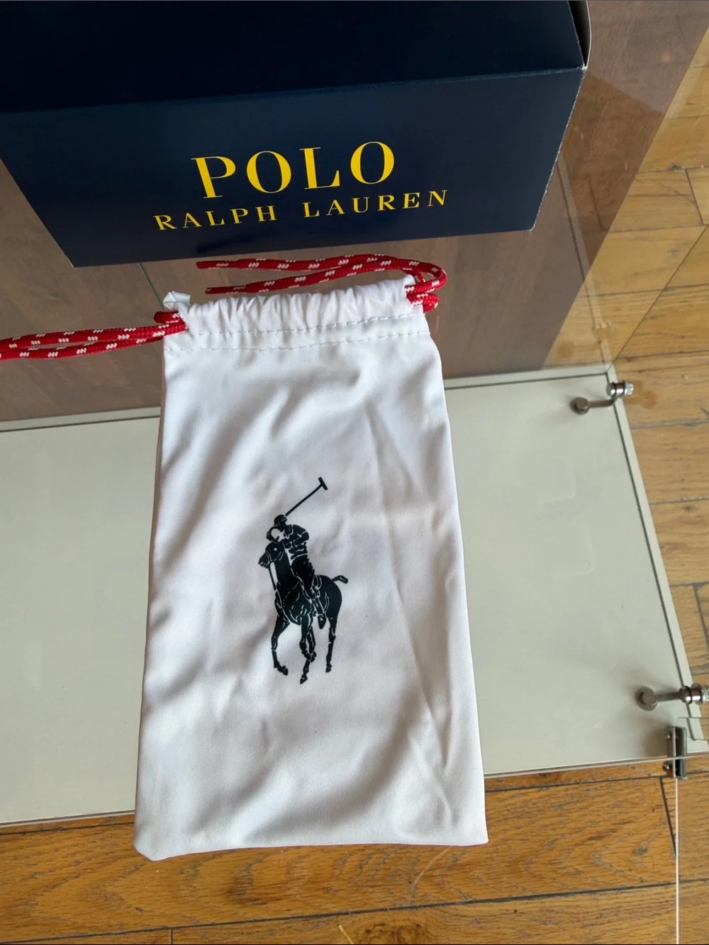 Ralph Lauren Polo Black Sunglasses with White Star Pattern and Red Temples